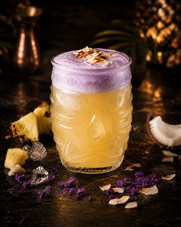 Ube Piña Colada — signature cocktail at Surf Bar Waikiki